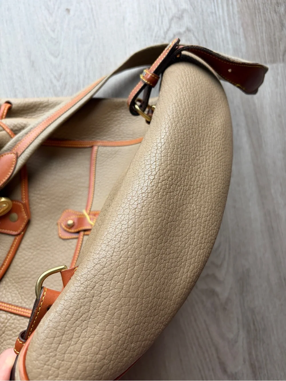 Dooney & Bourke Beige Leather Drawstring Backpack with Tan Trim